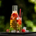 Homemade strawberry ice tea in the garden Royalty Free Stock Photo