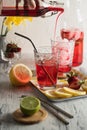 Homemade strawberry lemonade and slashing ice cubes Royalty Free Stock Photo