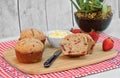 Homemade strawberry muffins, cut and whole, with fresh strawberries. Copy space Royalty Free Stock Photo