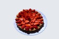 Homemade strawberry pie ready to eat on white background. Royalty Free Stock Photo
