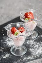 Homemade strawberry sorbet in glass on a wooden table Royalty Free Stock Photo