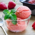 Homemade strawberry sorbet in glass on a wooden table, square Royalty Free Stock Photo