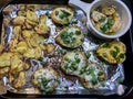 Homemade stuffed potato skins with bacon and chives. Royalty Free Stock Photo