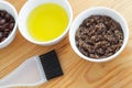 Homemade sugar, olive oil and ground coffee face and body scrub. Diy cosmetics.