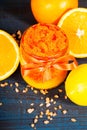 Homemade sugar scrub with Orange on a wooden background Royalty Free Stock Photo