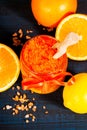 Homemade sugar scrub with Orange on a wooden background Royalty Free Stock Photo