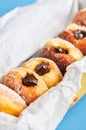 Homemade sugary doughnuts or berliners with chocolate filling