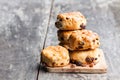 Homemade sultana scones on wooden table