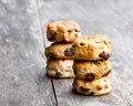 Homemade sultana scones on wooden table