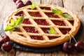 Homemade summer pastries cherry pie Crostata close-up. horizontal