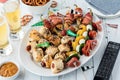 Homemade super bowl appetizers served with beer and pretzels. Royalty Free Stock Photo