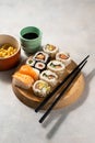 Homemade sushi rolls with salmon, shrimp, avocado. Assorted sushi. Royalty Free Stock Photo