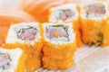 Homemade sushi with salmon, cream cheese Philadelphia, Japanese Royalty Free Stock Photo