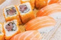 Homemade sushi with salmon, cream cheese Philadelphia, Japanese Royalty Free Stock Photo