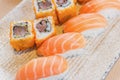 Homemade sushi with salmon, cream cheese Philadelphia, Japanese Royalty Free Stock Photo