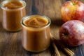 Homemade Sweet Apple Butter with Cinnamon Sticks and Apples. Royalty Free Stock Photo