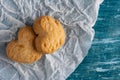 Homemade sweet cookies on the blue wooden cutting board. holiday, celebration and cooking concept. flat lay, top view, copy paste Royalty Free Stock Photo