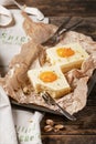 Homemade `Fried eggs` apricot cake with pistachios. Royalty Free Stock Photo