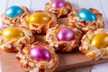 Homemade sweet Italian Easter Bread Rings with dyed eggs