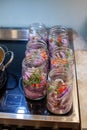 Homemade sweet and spicy pickled red onions sliced in a large mason glass jar Royalty Free Stock Photo