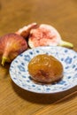 Homemade sweeten preserved fig and fresh figs. Royalty Free Stock Photo