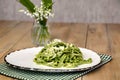 Homemade tagliatelle with wild garlic are fresh homemade pasta made in a rustic style.