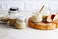 Homemade tahini in glass jars