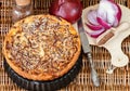 Homemade tart of red onion with sesame and flax seed Royalty Free Stock Photo