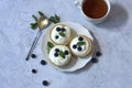 Homemade Tartlets with cream cheese and fresh berries - blueberry