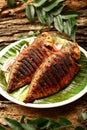 Top view Delicious grilled fish served in plate. Royalty Free Stock Photo