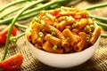 Delicious pasta penne with herbs served in bowl. Royalty Free Stock Photo