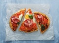 Homemade tasty pizza with egg, cheese, tomatoes and basil. Royalty Free Stock Photo