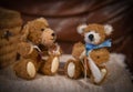 Homemade teddy bears sewing another teddy bear Royalty Free Stock Photo