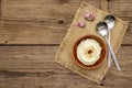 Homemade Thanksgiving garlic mashed potatoes with salt and pepper. Sackcloth napkin, spoons, old wooden boards background Royalty Free Stock Photo