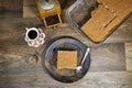 homemade tiramisu Italian dessert topped with coffee grinder, bean served on a black plate Royalty Free Stock Photo