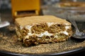 homemade tiramisu Italian dessert topped with coffee grinder, bean served on a black plate Royalty Free Stock Photo