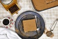 homemade tiramisu Italian dessert topped with coffee grinder, bean served on a black plate Royalty Free Stock Photo