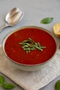 Homemade Tomato Basil Soup in a Bowl, side view. Close-up Royalty Free Stock Photo