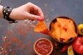 Homemade tortilla nacho chips hand sauce dip Royalty Free Stock Photo