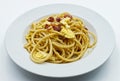 Homemade traditional Italian Spaghetti alla carbonara with egg yolk isolated on white Royalty Free Stock Photo