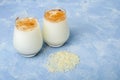 Homemade traditional mexican or spanish cool rice Horchata in a glass on blue background. Fresh cool drink or cocktail made from Royalty Free Stock Photo