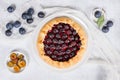 Homemade traditional plum galette on the white plate