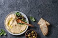 Hummus with olives and herbs Royalty Free Stock Photo