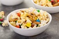 Homemade trail mix with chocolate candy, popcorn, pretzels and nuts Royalty Free Stock Photo