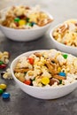 Homemade trail mix with chocolate candy, popcorn, pretzels and nuts Royalty Free Stock Photo