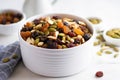 homemade trail mix in a white ceramic bowl Royalty Free Stock Photo