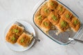 Homemade Turkish Dessert Fincan Kadayif Baklava / Baklawa with Pistachio Powder. Royalty Free Stock Photo