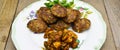 Homemade Turkish meatballs kofte or kofta and saute the mushrooms