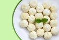 Homemade unbaked coconut balls on a plate Royalty Free Stock Photo