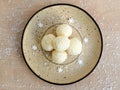Homemade unbaked coconut balls on a plate Royalty Free Stock Photo